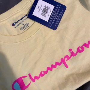 Yellow with pink logo Champion shirt